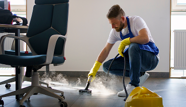 steaming carpets with steam cleaning machine