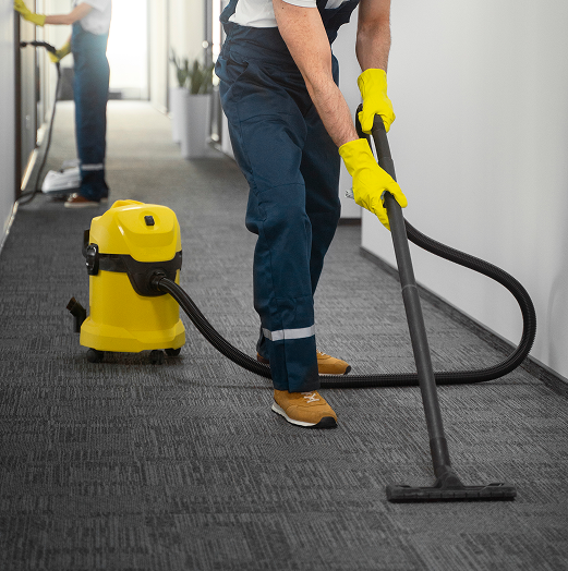 man cleaning carpets