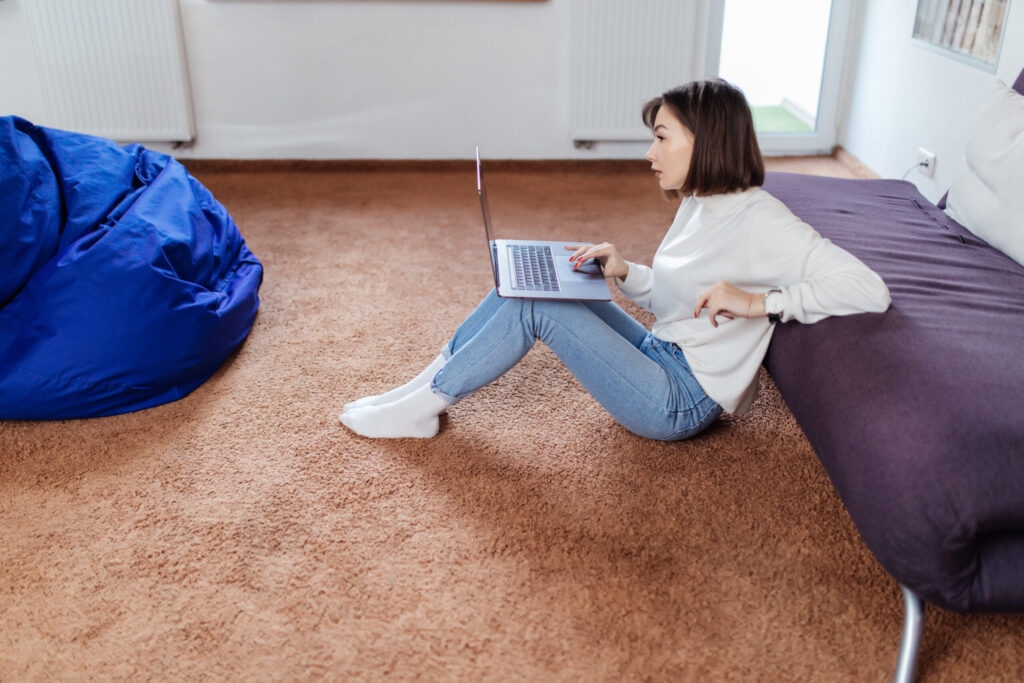 girl sitting on the carpet