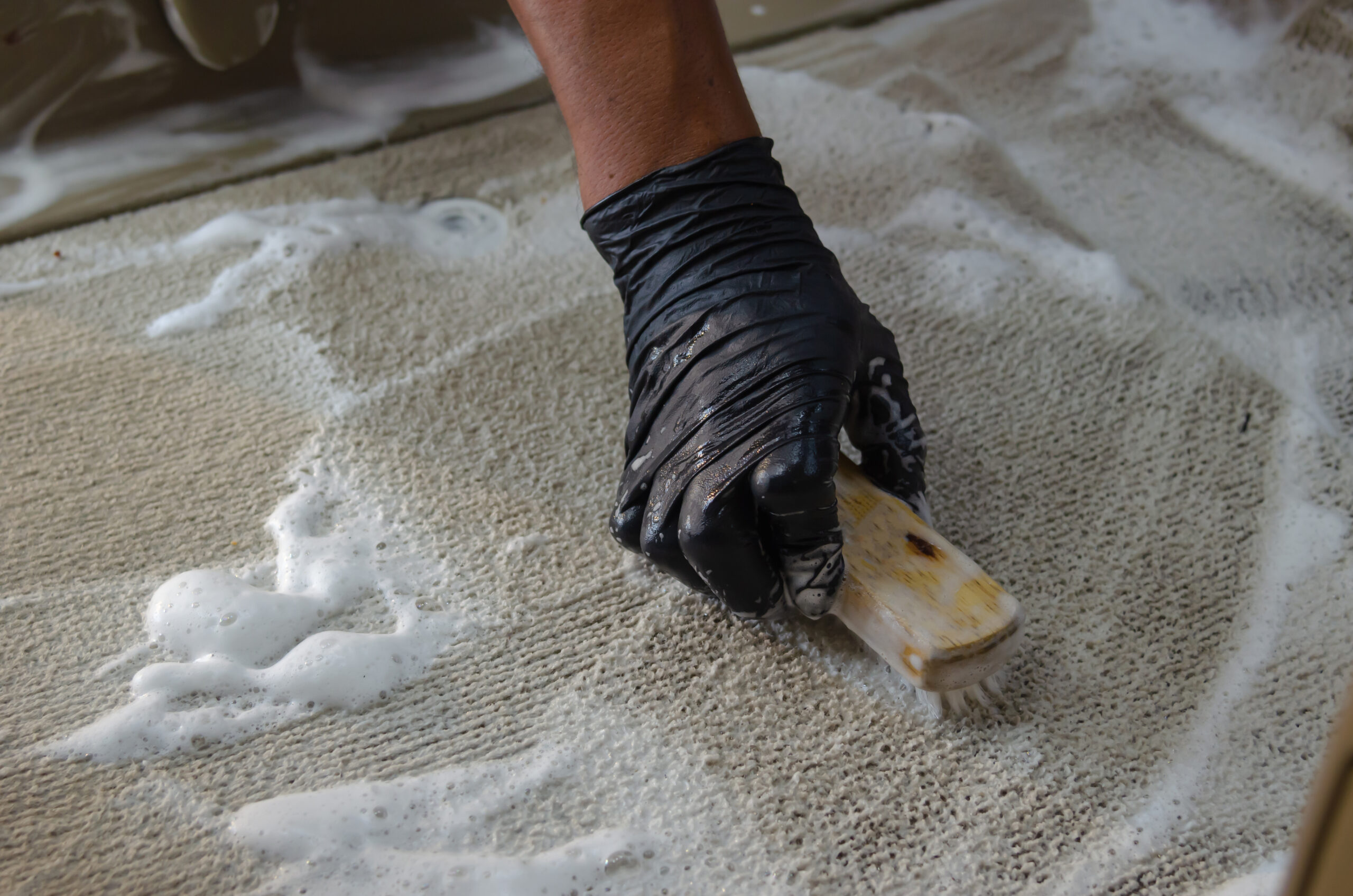 washing carpet with soap